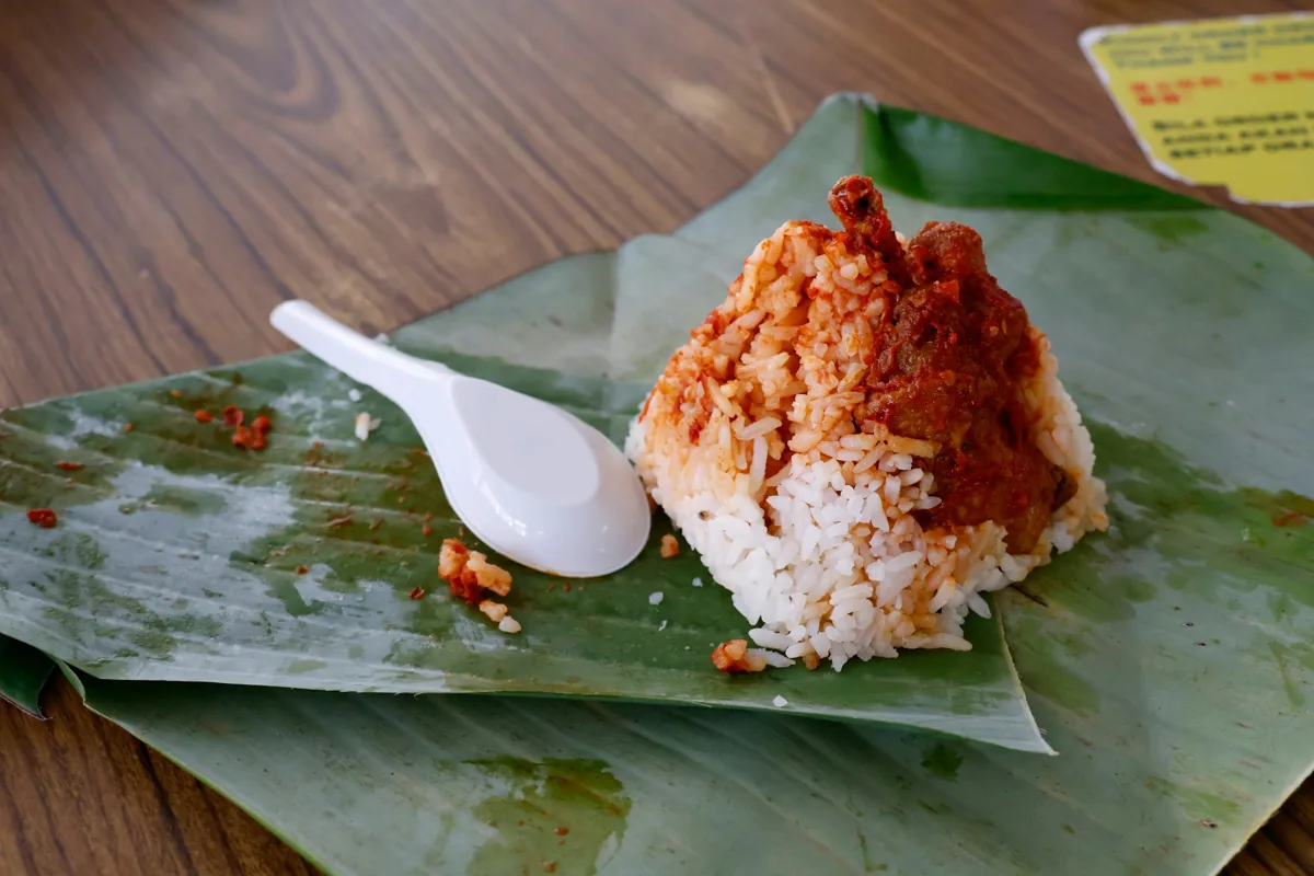 Nasi lemak with sambal served on a banana leaf in George Town